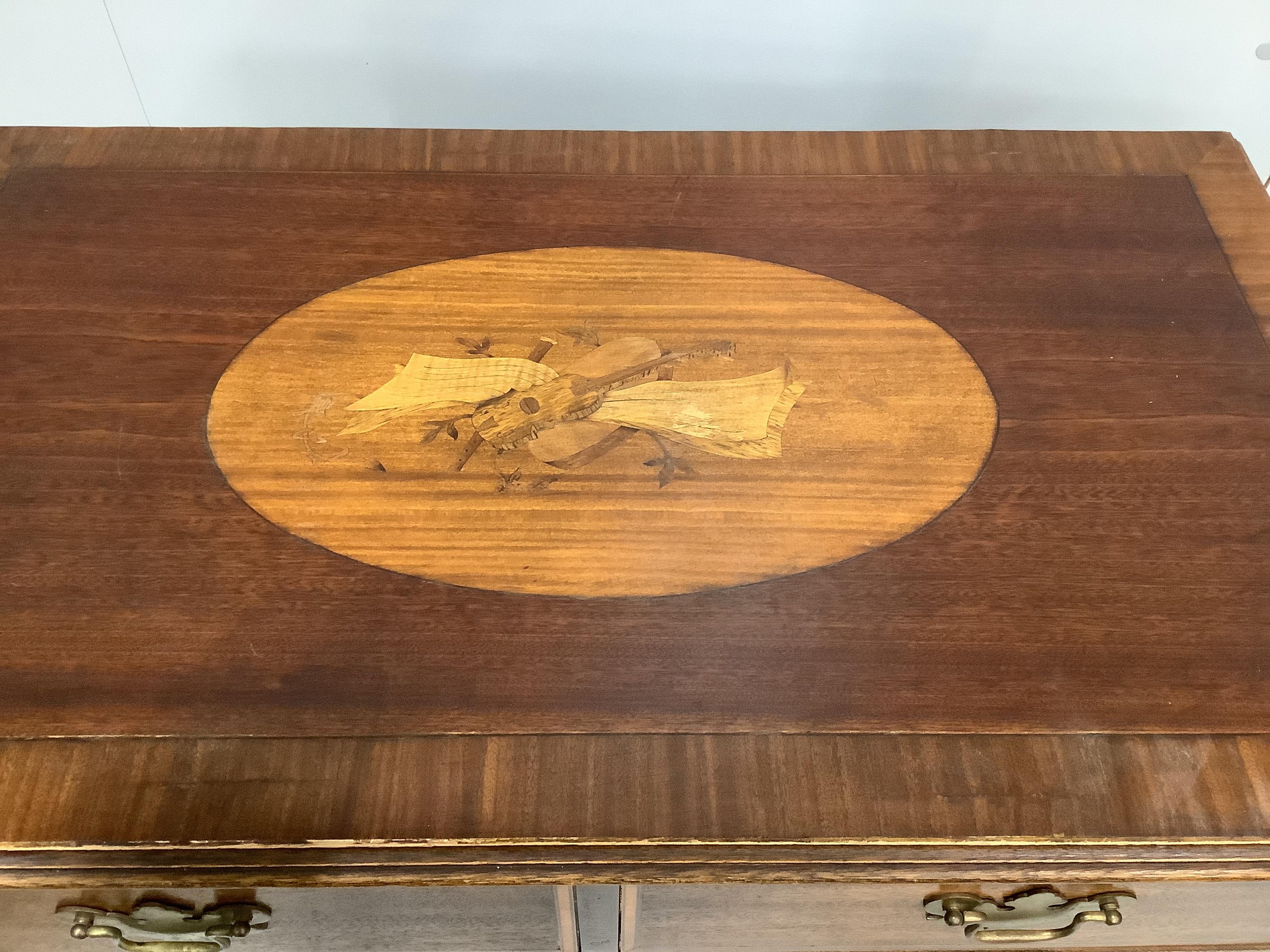 A reproduction George III style banded mahogany chest of drawers, with a later oval marquetry inlaid inset top, width 94cm, depth 53cm, height 91cm